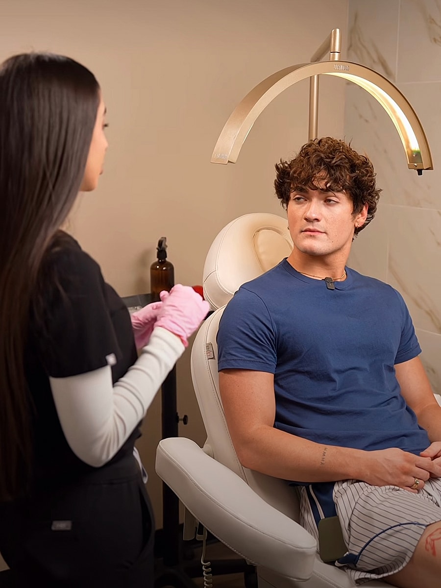 Client consultation in a skincare treatment session.