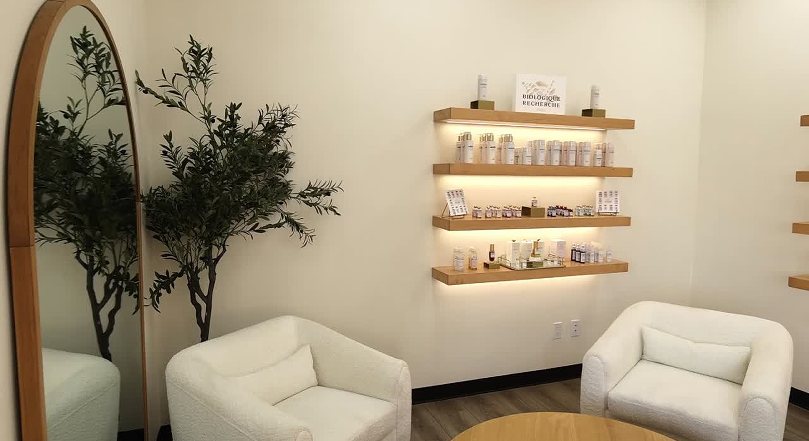 Spa interior with products and seating area.