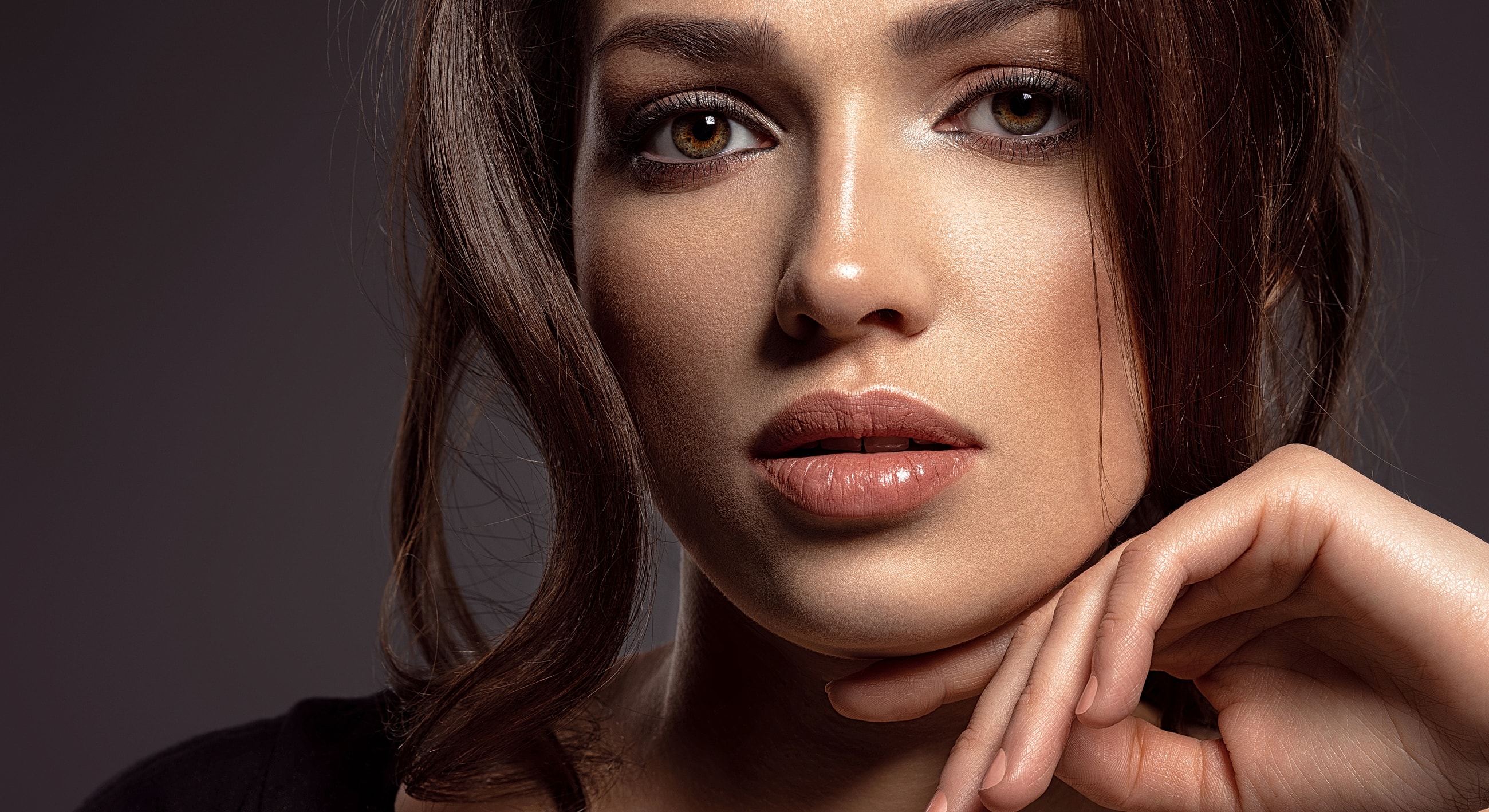Close-up of a woman's face and expression.