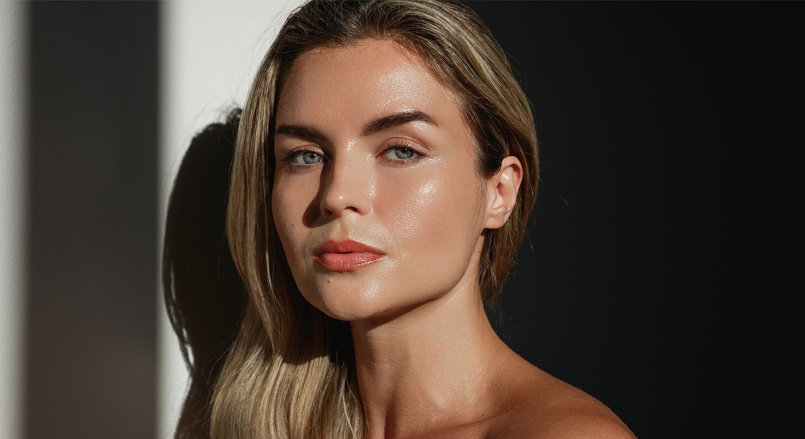 Woman with glowing skin and natural light.